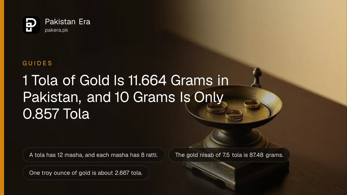 A small brass weighing scale with a few gold rings in one pan on a dark wooden table