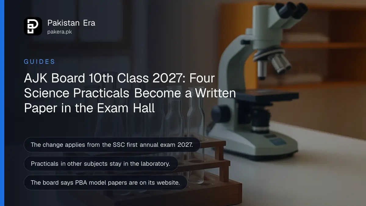 Glass beakers, test tubes in a rack and a microscope on a clean school laboratory bench in daylight