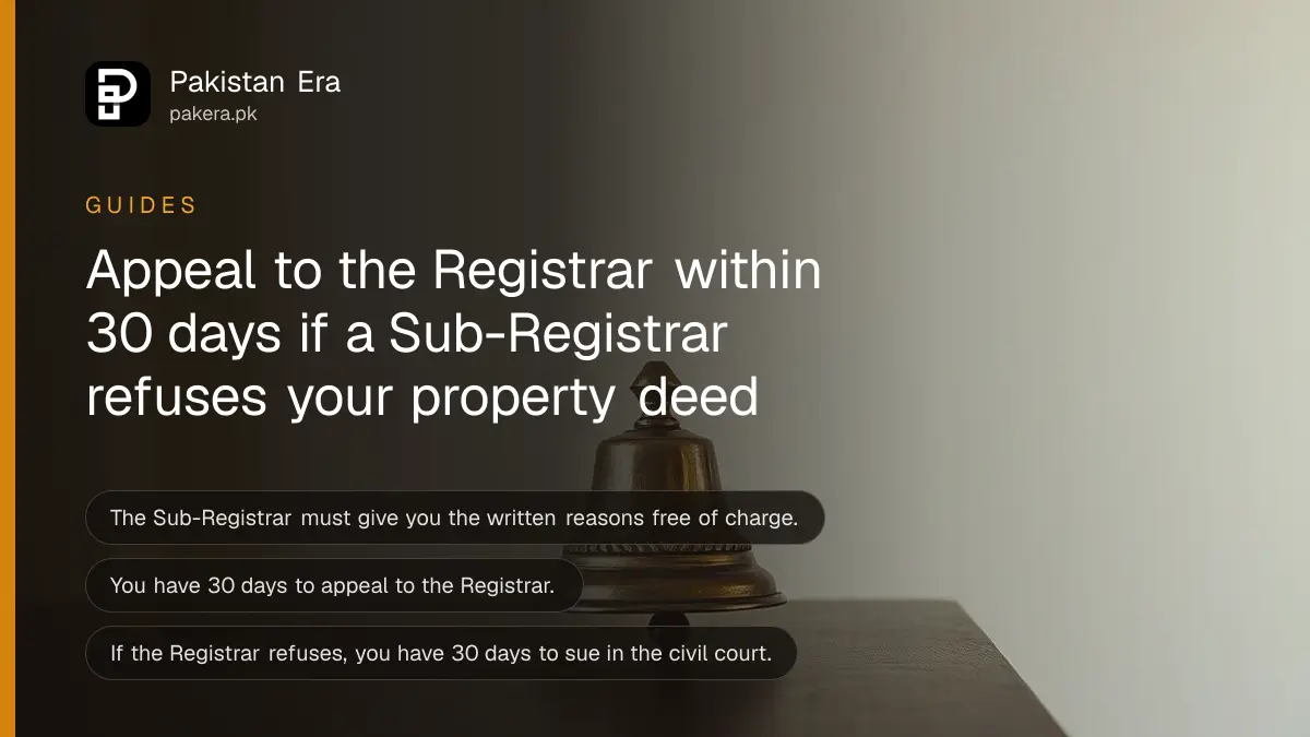 A small bell on a dark wooden table, for a guide on appealing a registration refusal in Pakistan