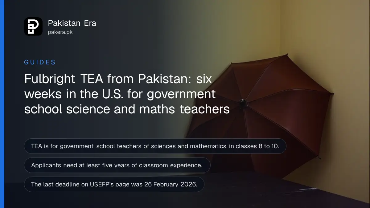 A plain umbrella on a dark wooden table, for an article on the Fulbright TEA programme in Pakistan