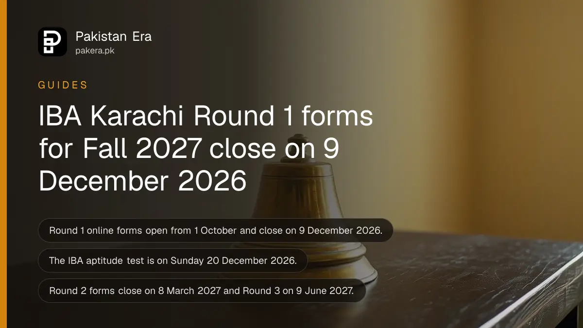A brass bell on a dark wooden table, for a guide to IBA Karachi Fall 2027 admission dates in Pakistan