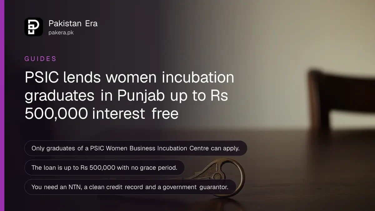 A brass key on a dark wooden table, for an article on the PSIC loan for women incubation graduates in Punjab