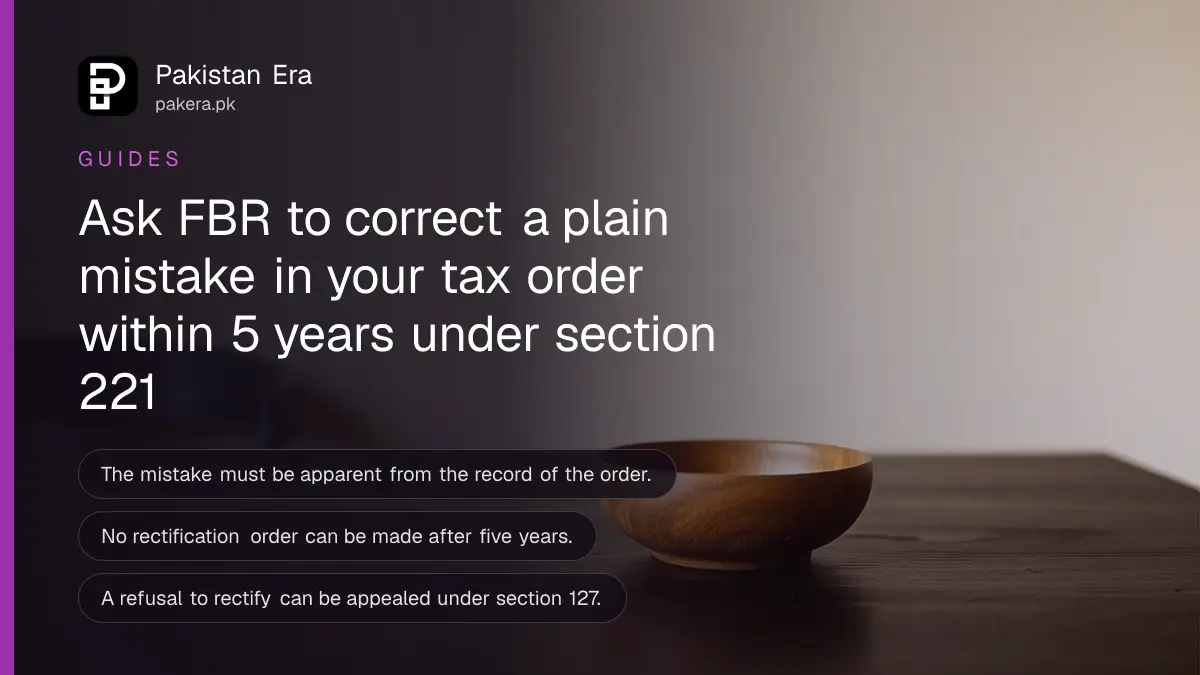 A plain wooden bowl on a dark wooden table, for an article on section 221 rectification fbr