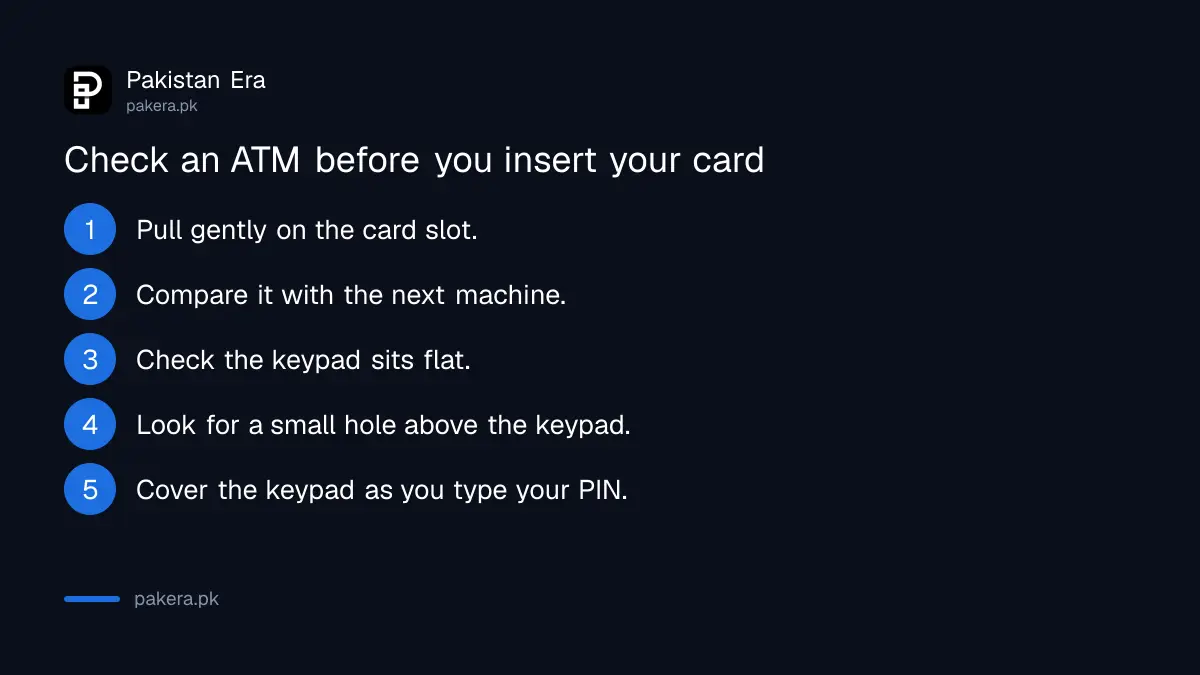 Signs of a card skimmer on an ATM in Pakistan
