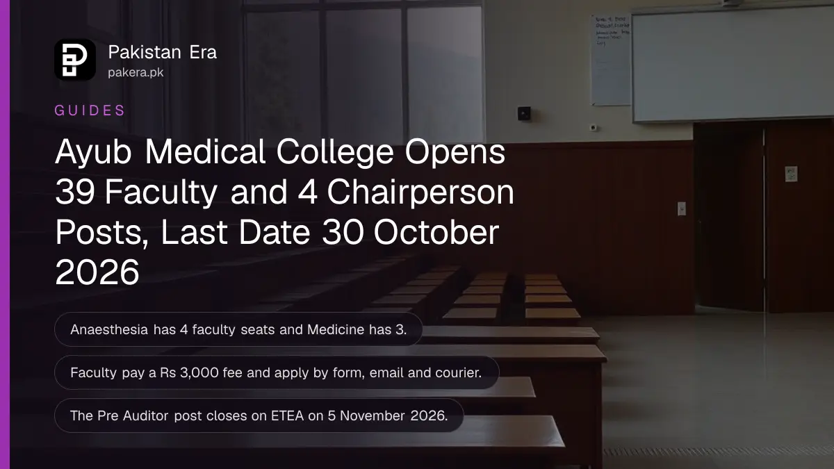 An empty lecture hall with wooden benches and pine hills seen through tall windows