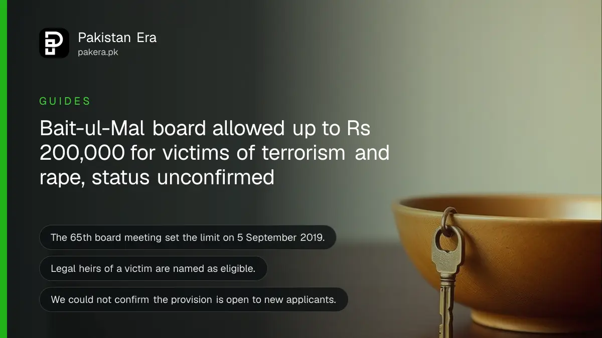 A brass key and a wooden bowl on a dark wooden table, for an article on bait ul mal victims assistance