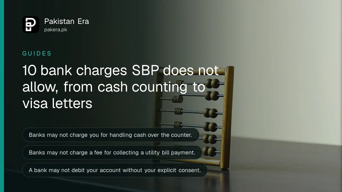 A small brass abacus on a dark wooden table, for a guide on bank charges SBP does not allow in Pakistan