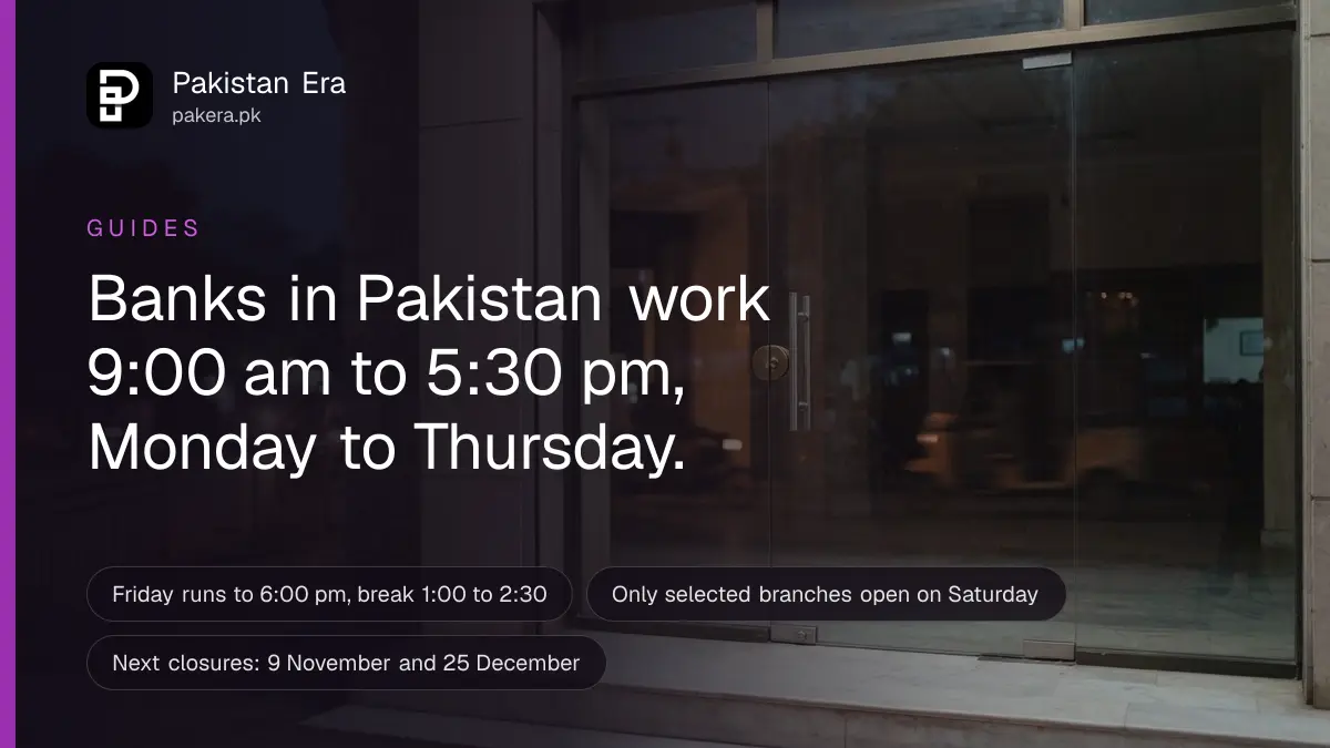 A closed glass bank-style door in Lahore at evening with city lights reflected in the glass