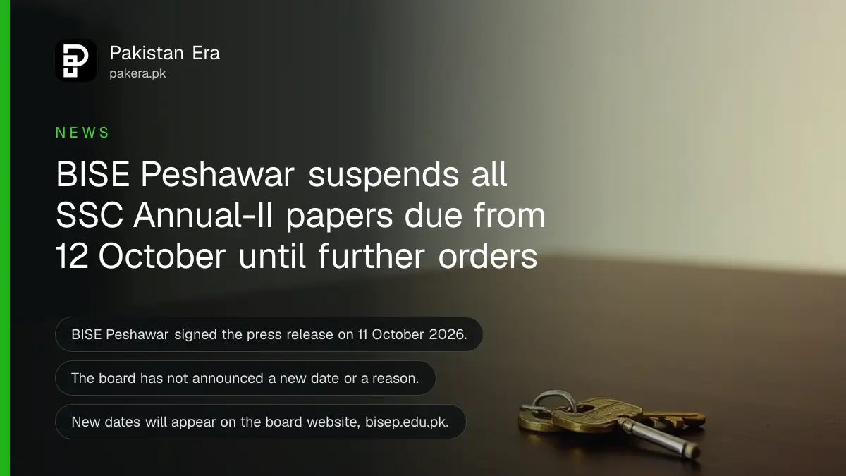 A brass key on a dark wooden table, for an article on BISE Peshawar SSC Annual-II 2026 exam suspended