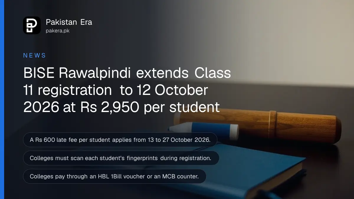 A wooden pencil case, an eraser and a blue notebook on a wooden table