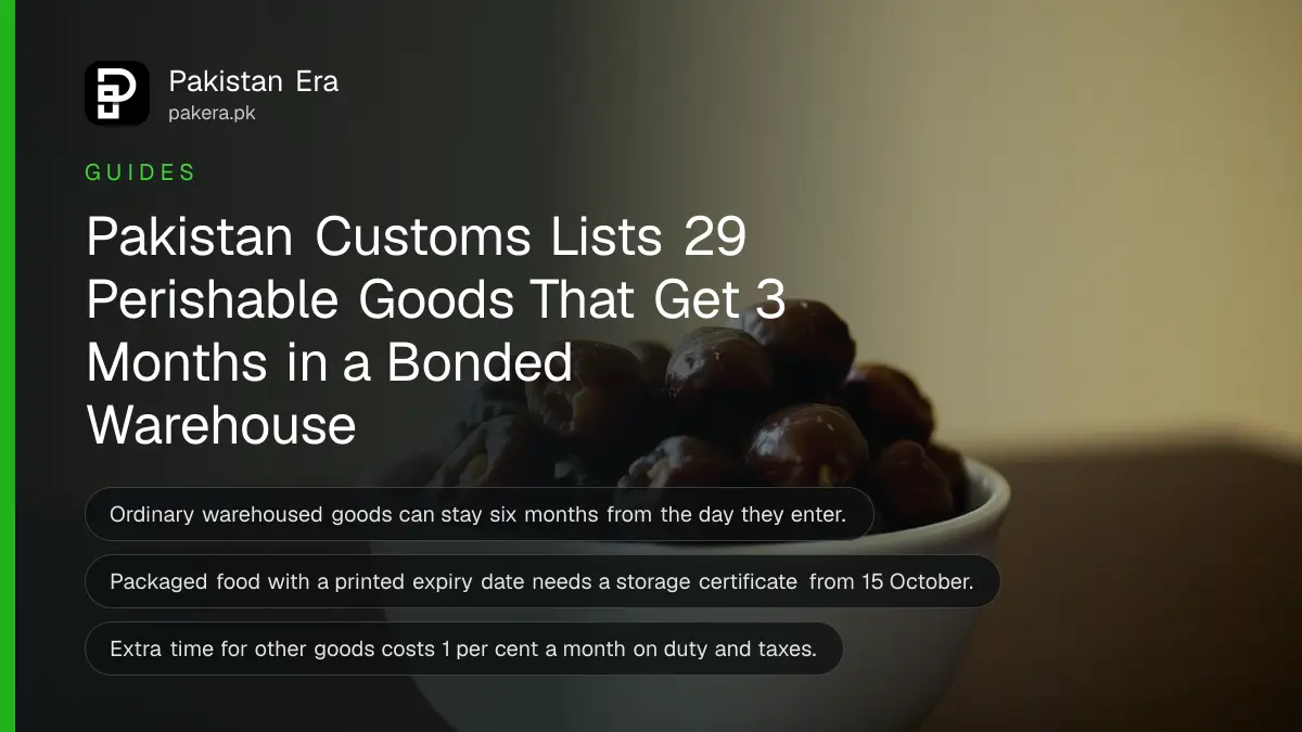 A white porcelain bowl of dates on a dark wooden table against a plain cream wall