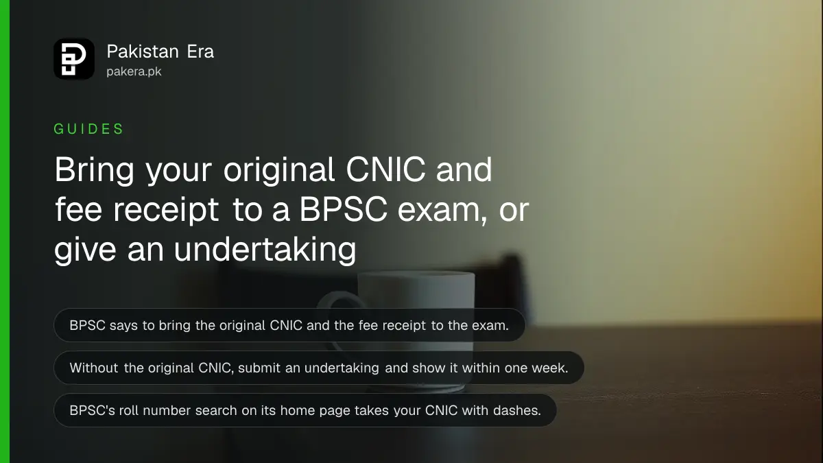 A plain mug on a dark wooden table, for a guide to what to bring to a BPSC exam in Balochistan