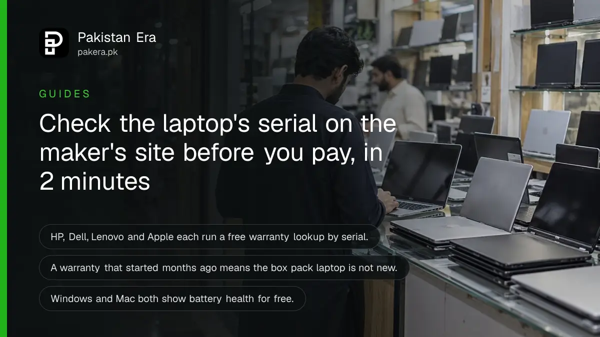 A customer seen from behind looking at open laptops on the counter of a busy computer market shop in Lahore