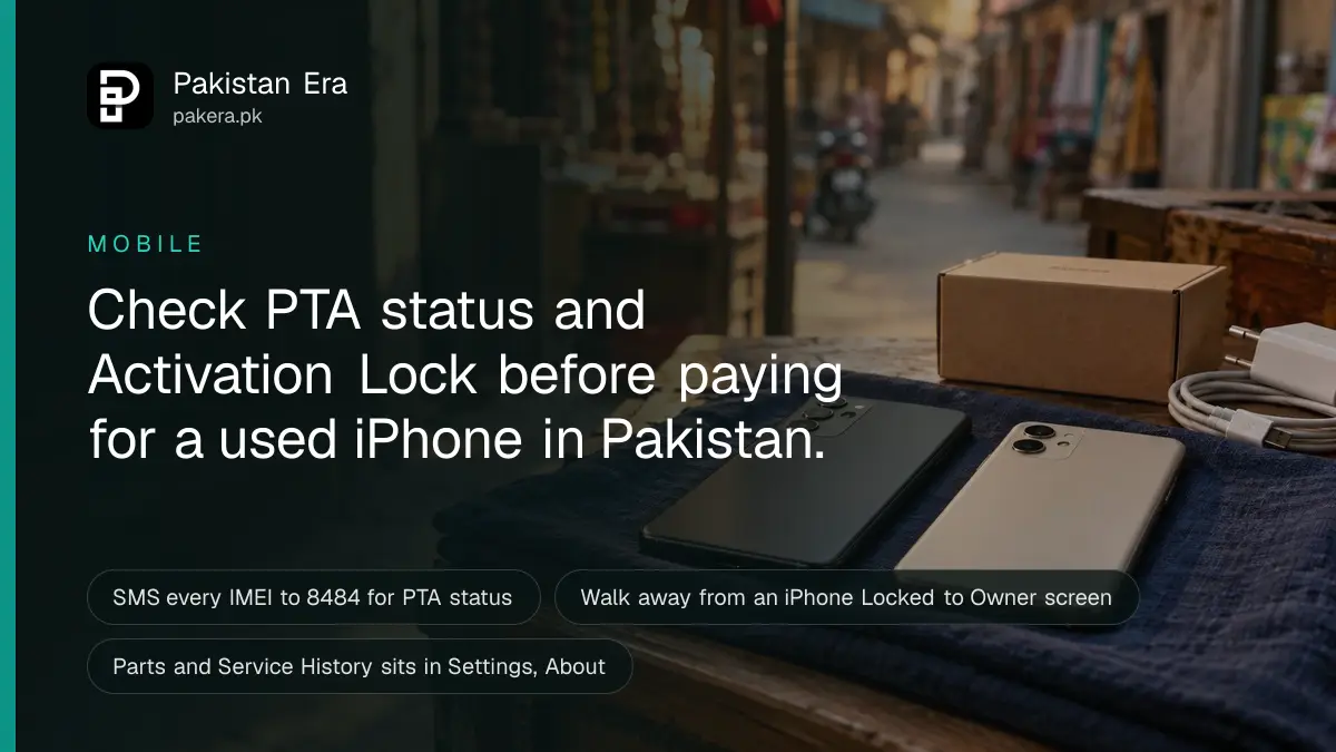 Two phones lying face down on a folded cloth at a small market stall in Lahore