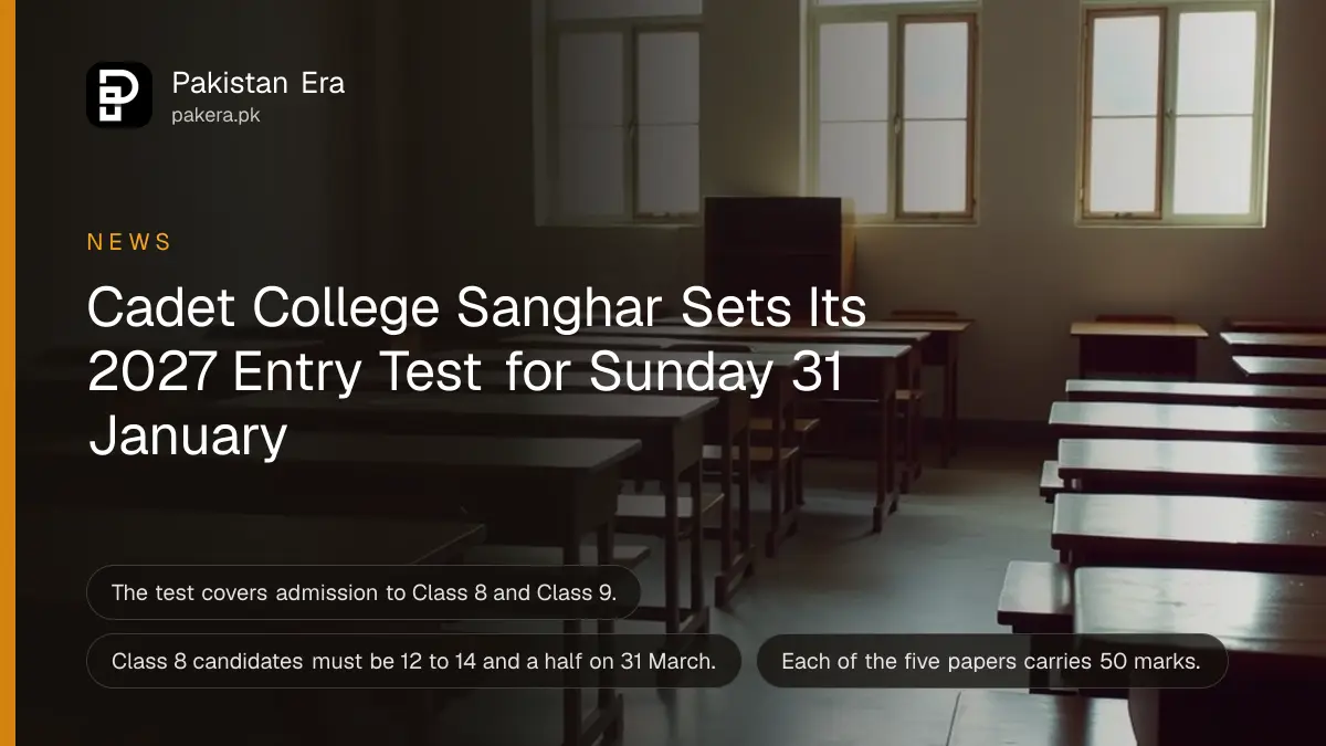 Rows of empty wooden school desks in a quiet classroom with morning light from tall windows