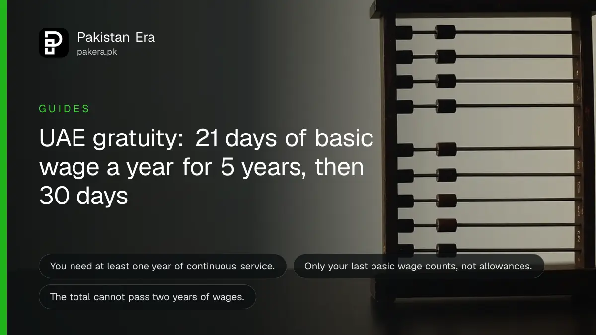 An abacus on a dark wooden table, for a guide to calculating the UAE end-of-service gratuity