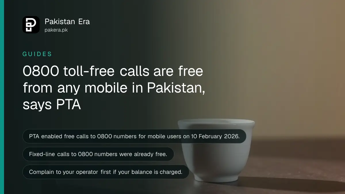 A plain ceramic cup on a dark wooden table, for a guide on free 0800 toll-free calls from mobile in Pakistan