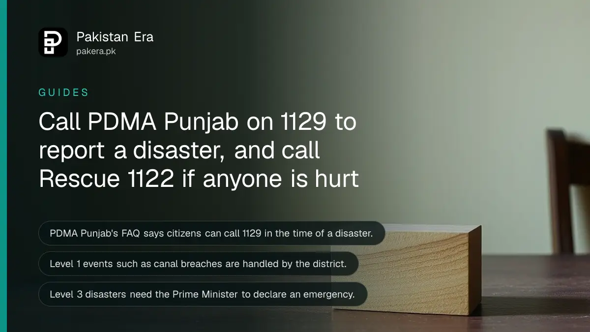 A wooden block on a dark wooden table, for a guide to reporting disasters to PDMA Punjab