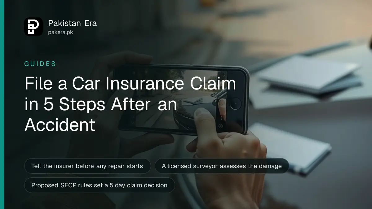 A driver photographing a dented car bumper at the roadside while holding a folder of insurance papers