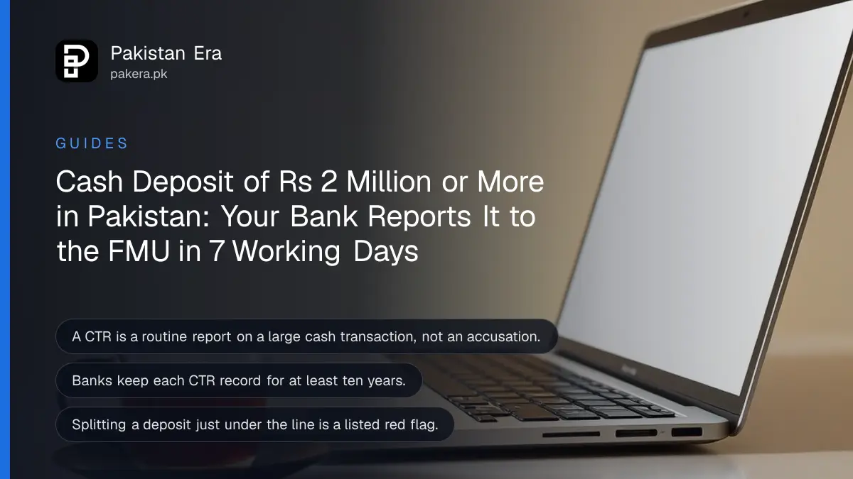 A laptop and a cup of tea on a home desk