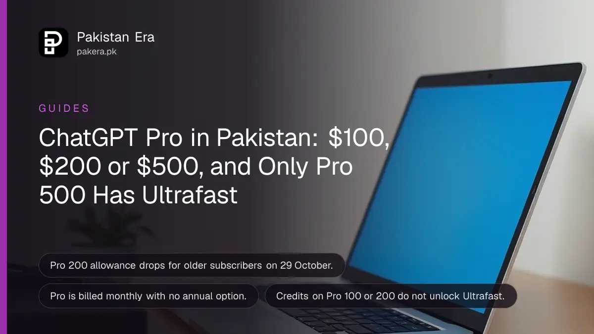 An open laptop with a glowing screen on a tidy desk beside a plant