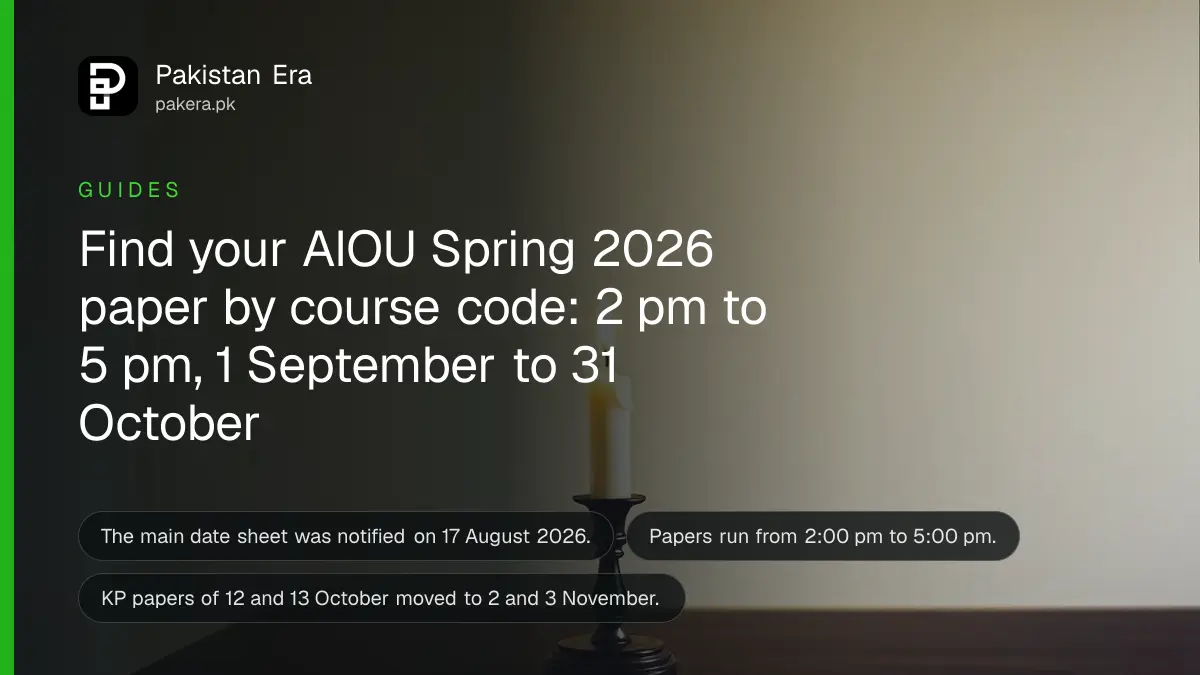 A candle on a dark wooden table, for an article on checking the AIOU Spring 2026 date sheet