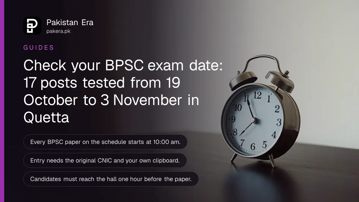 A small plain alarm clock on a dark wooden table, for a guide to the BPSC exam schedule
