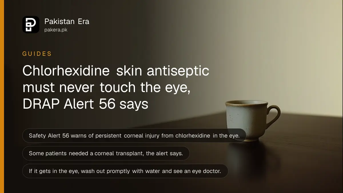 A small ceramic cup on a dark wooden table, for a guide to the DRAP chlorhexidine eye injury warning in Pakistan