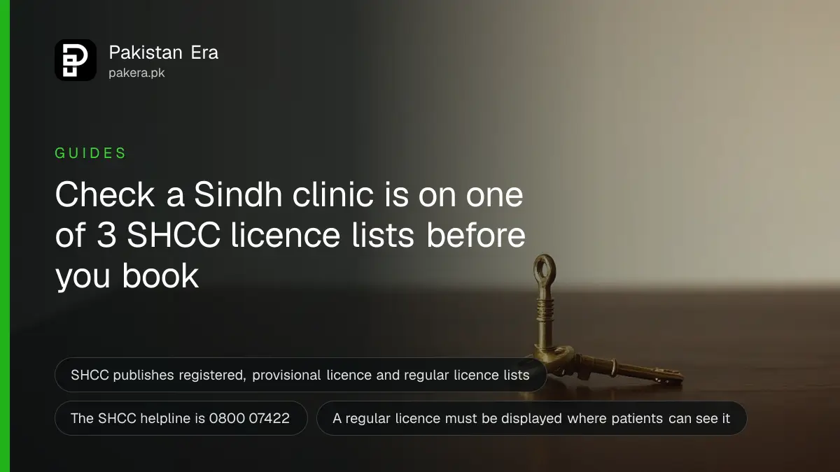 A brass key on a dark wooden table against a cream wall, for a guide to checking a clinic licence in Sindh