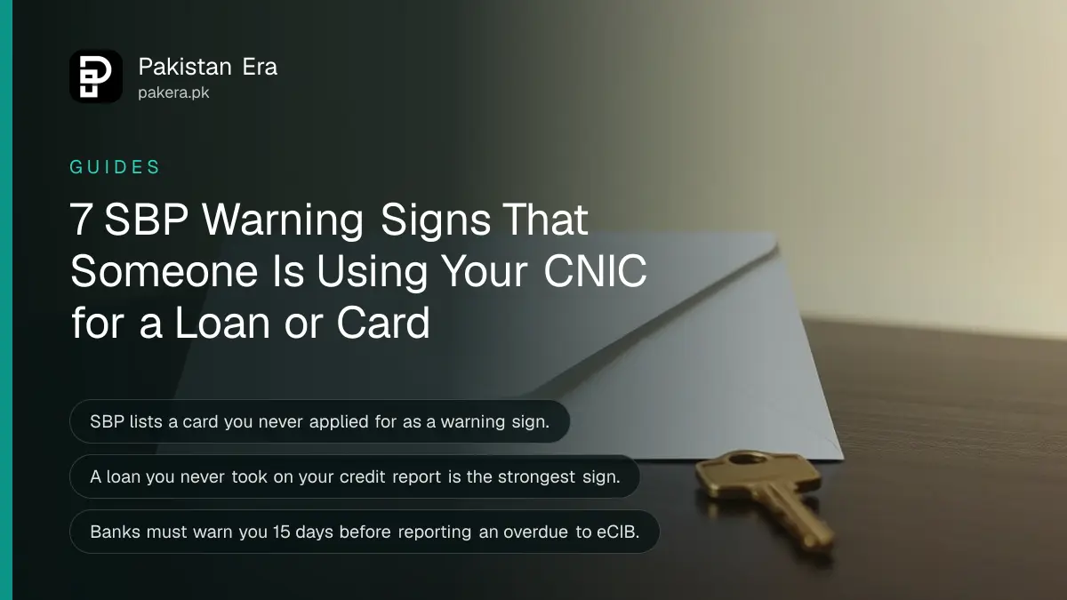 A plain brass key beside a blank envelope on a dark wooden table against a cream wall for an article on CNIC misuse