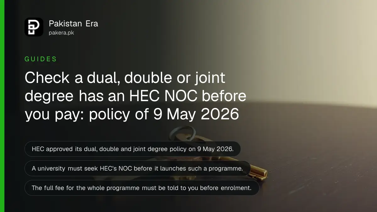 Two plain wooden keys on a dark wooden table, for a guide on dual and joint degrees in Pakistan