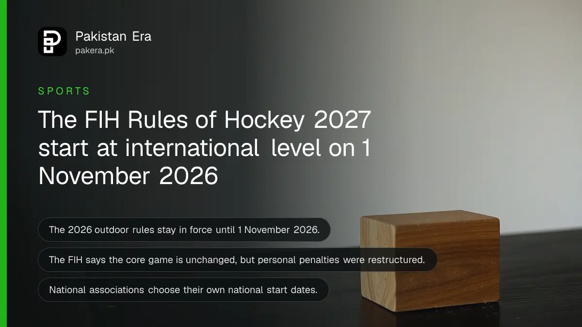 A wooden block on a dark wooden table, for a guide to the FIH Rules of Hockey 2027 starting in November 2026