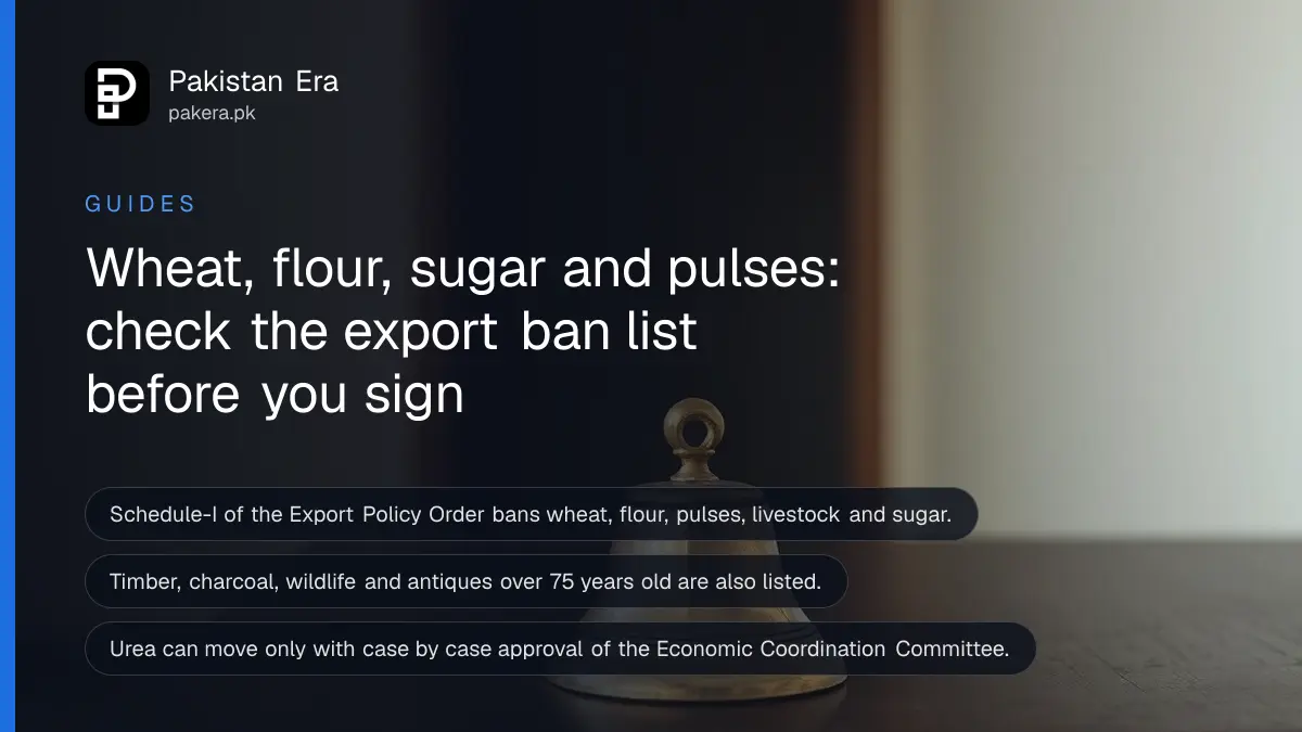 A brass bell on a dark wooden table, for a guide to checking whether goods are banned for export from Pakistan