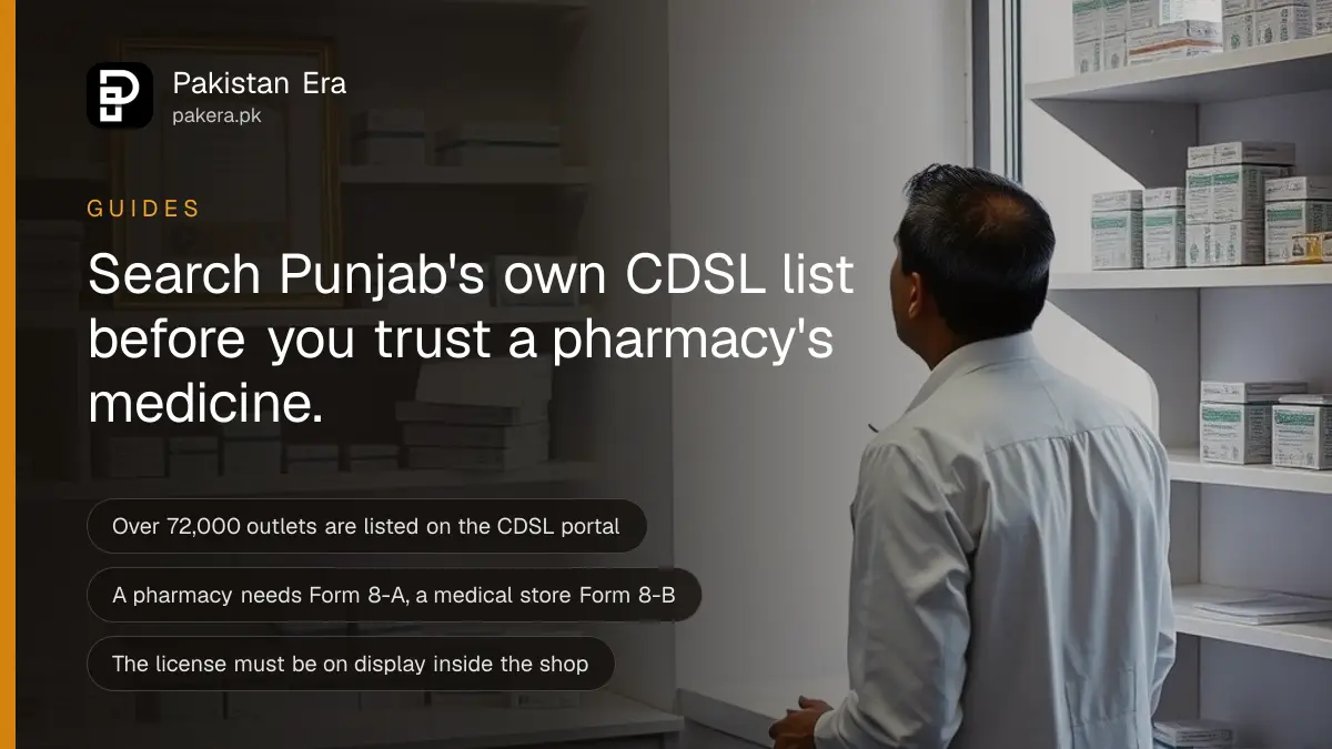 A pharmacist behind a counter checking a framed license certificate on the wall of a small medical store