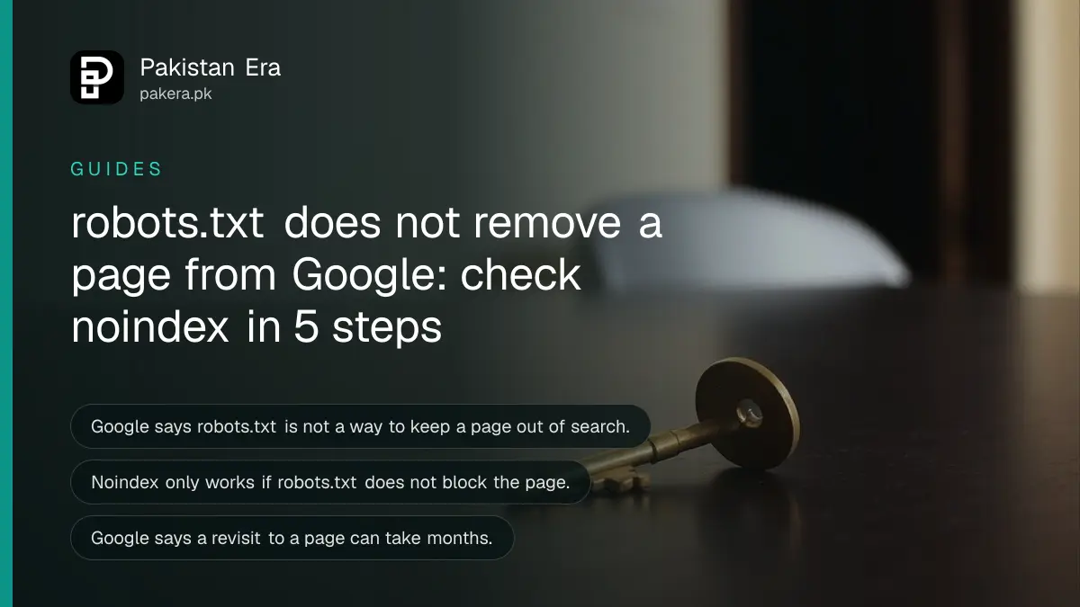 A brass key on a dark wooden table, for a guide on robots.txt and noindex blocking in Google