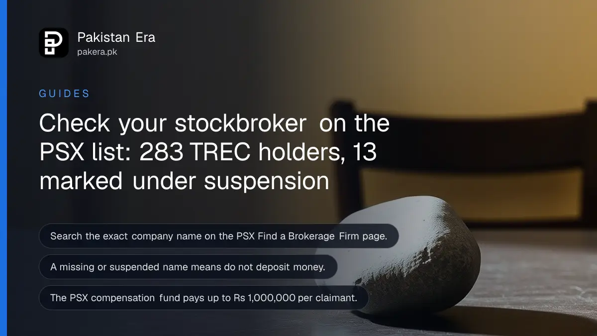 A smooth grey stone on a dark wooden table, for an article on check stockbroker psx