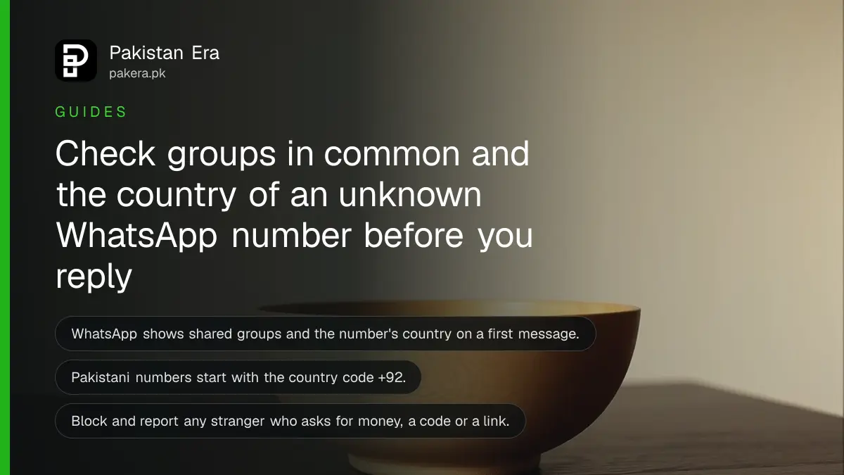 A wooden bowl on a dark wooden table, for a guide to check an unknown number on WhatsApp in Pakistan