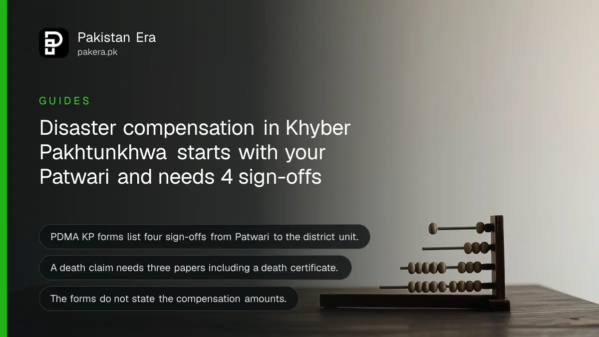 An abacus on a dark wooden table, for a guide to disaster compensation in Khyber Pakhtunkhwa