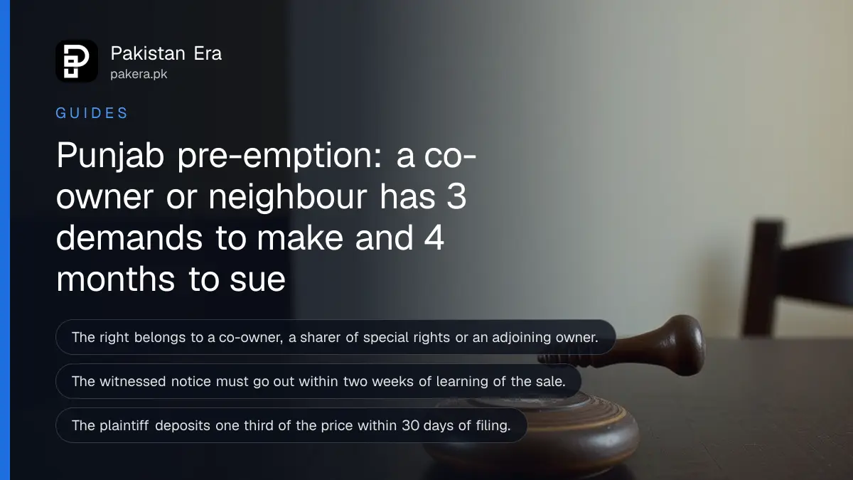 A wooden gavel on a dark wooden table, for a guide to claiming pre-emption on a property sale in Punjab