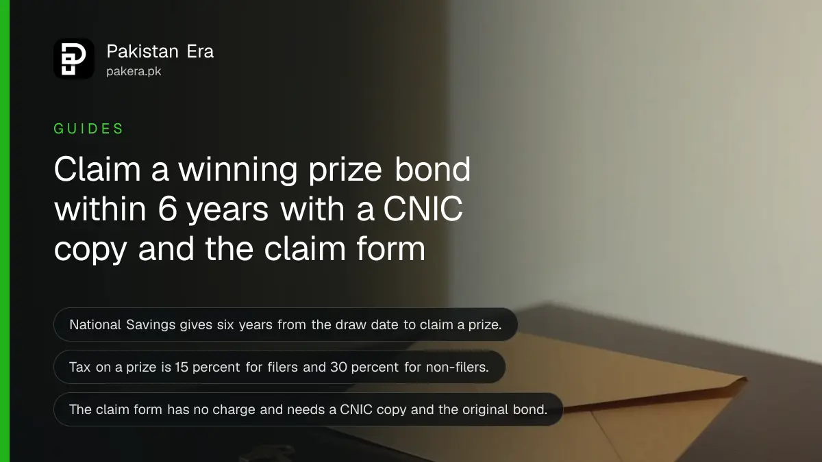 A small brass key and a plain brown envelope on a dark wooden table, for a guide on claiming a prize bond prize in Pakistan