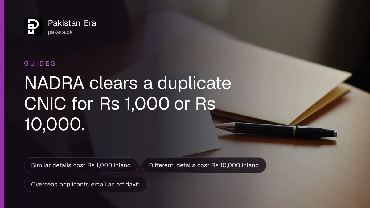 Two identical blank cards on a clean desk beside a pen and a closed folder