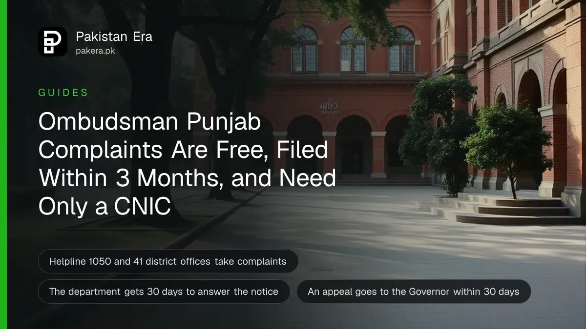 An old red brick government building in Lahore with arched windows and tall trees in front, an empty paved path, soft morning light
