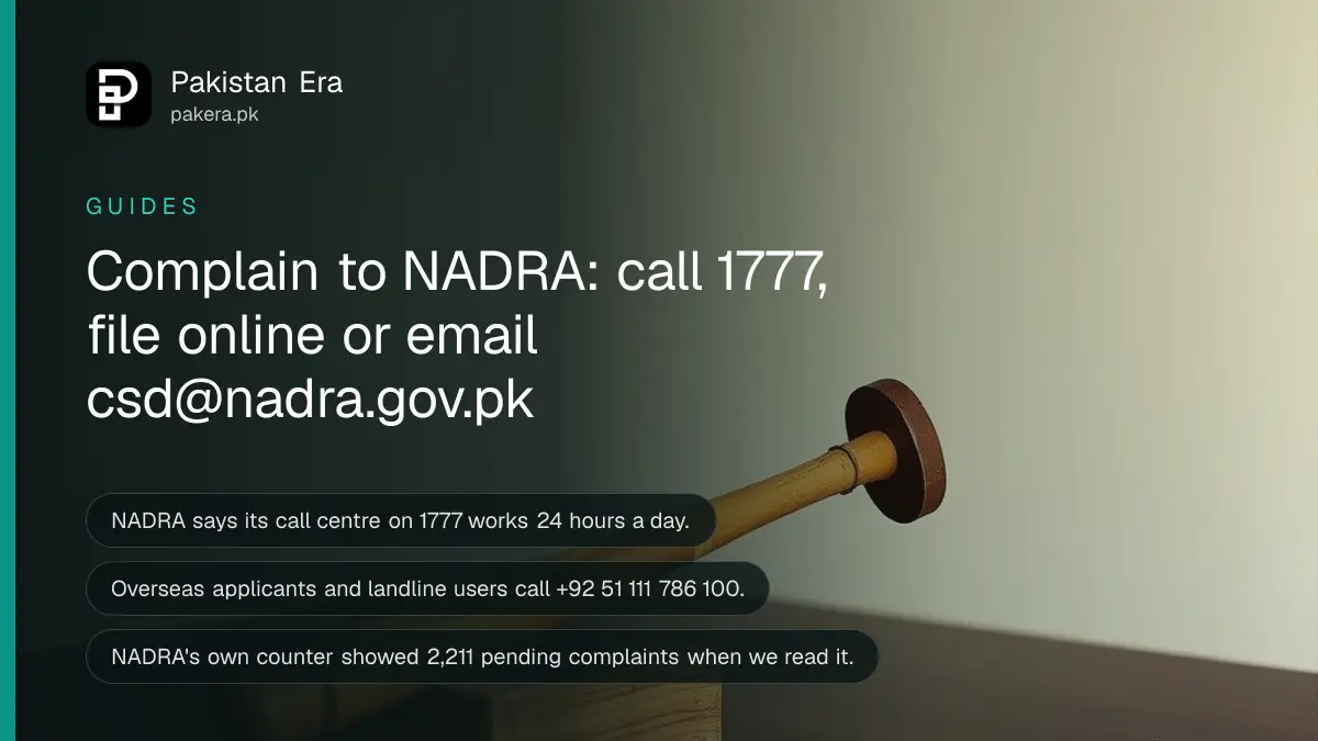 A wooden gavel on a dark wooden table, for a guide to complaining to NADRA in Pakistan