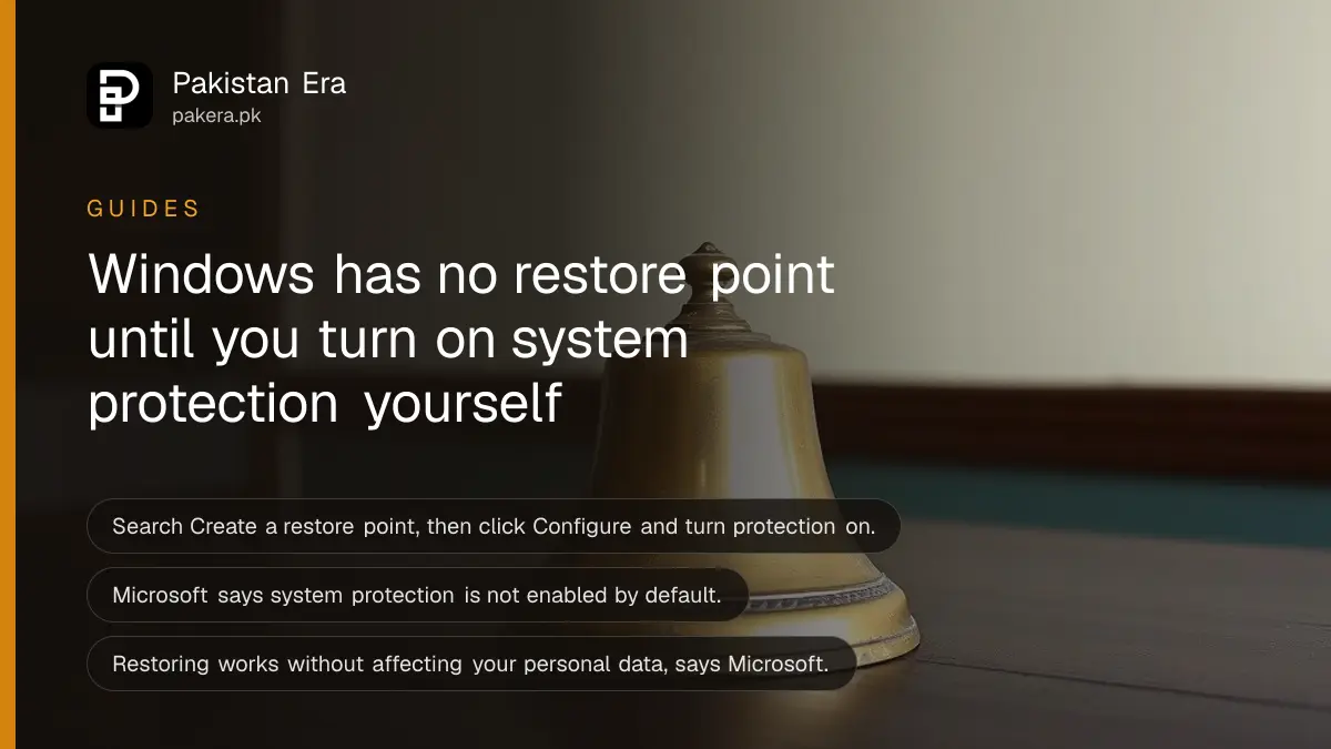 A brass bell on a dark wooden table, for a guide to creating a Windows restore point
