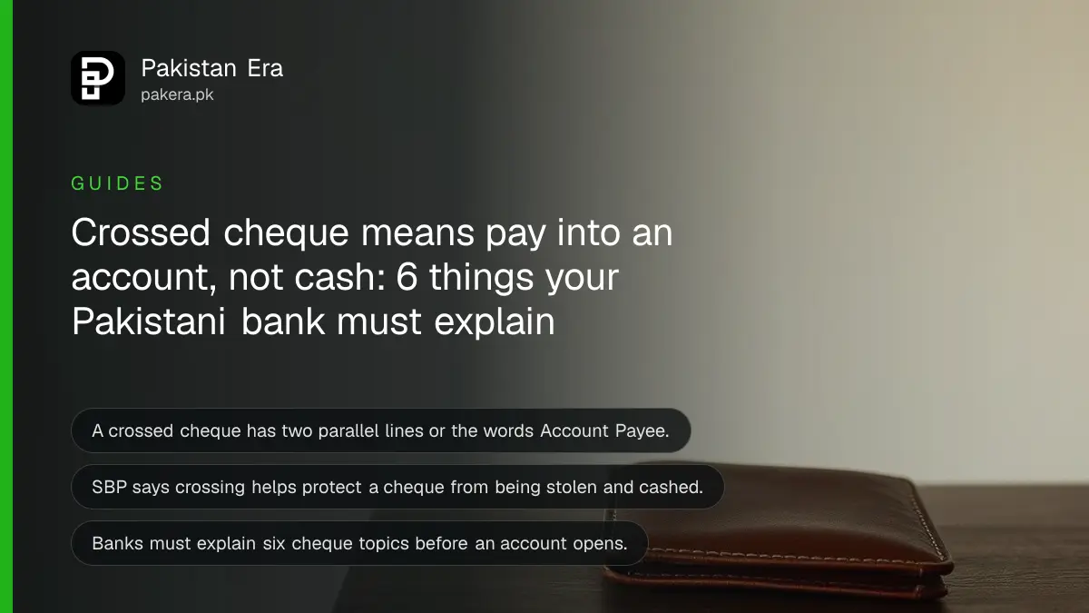 A closed leather wallet on a dark wooden table, for a guide on crossed cheques in Pakistan