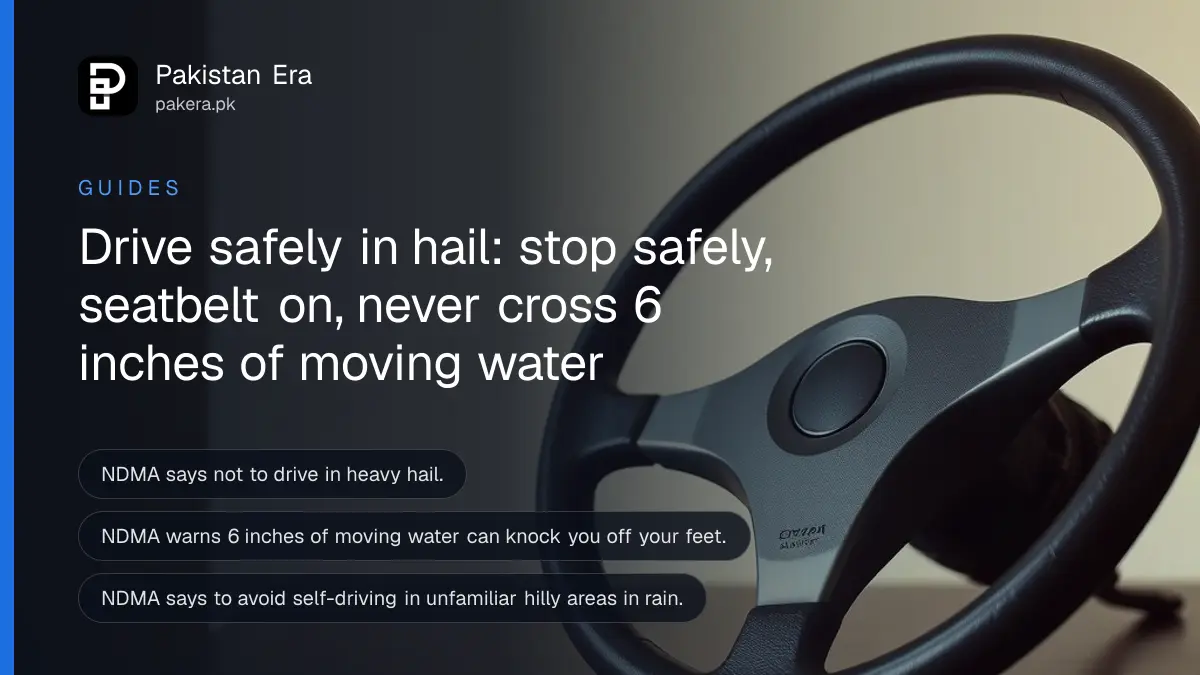 A plain steering wheel on a dark wooden table, for a guide to driving safely in hail