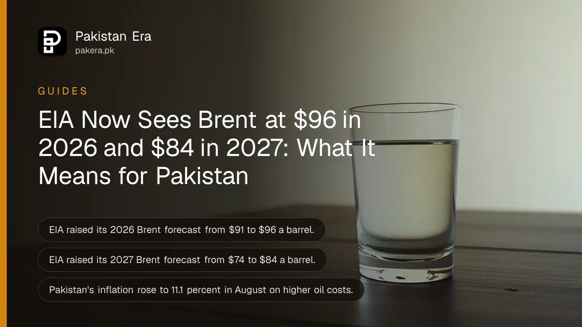 A glass of water on a dark wooden table against a plain cream wall in soft daylight