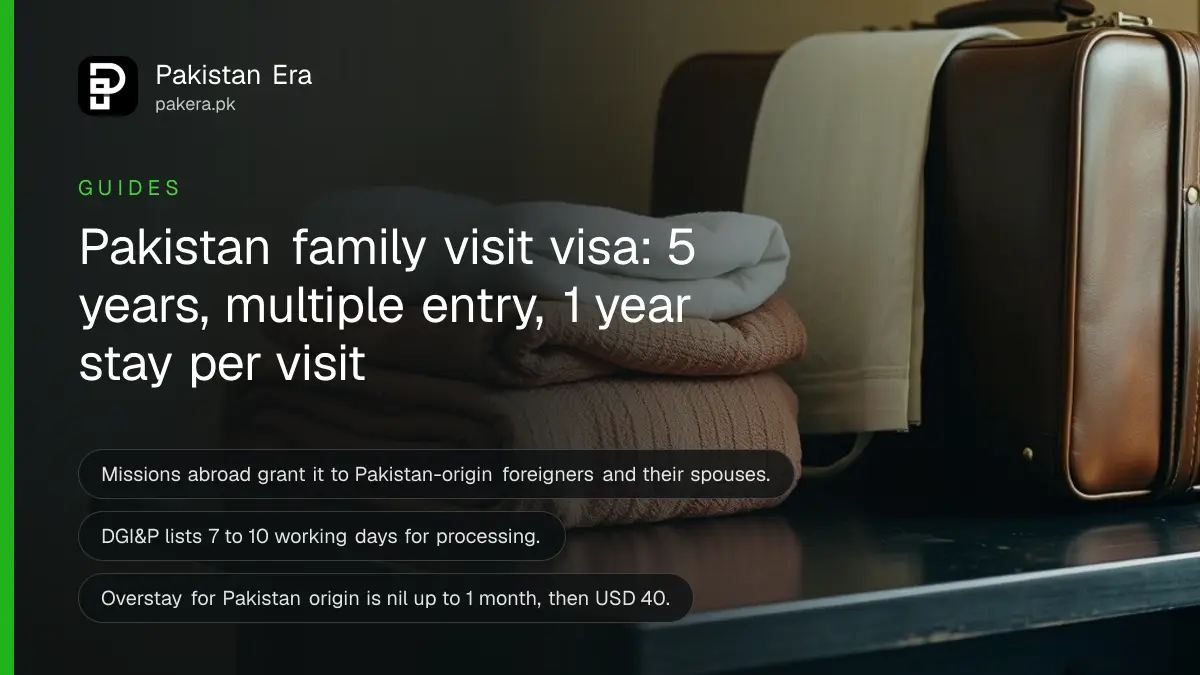 A leather suitcase and folded towels on a dark wooden table, for a guide on the Pakistan family visit visa