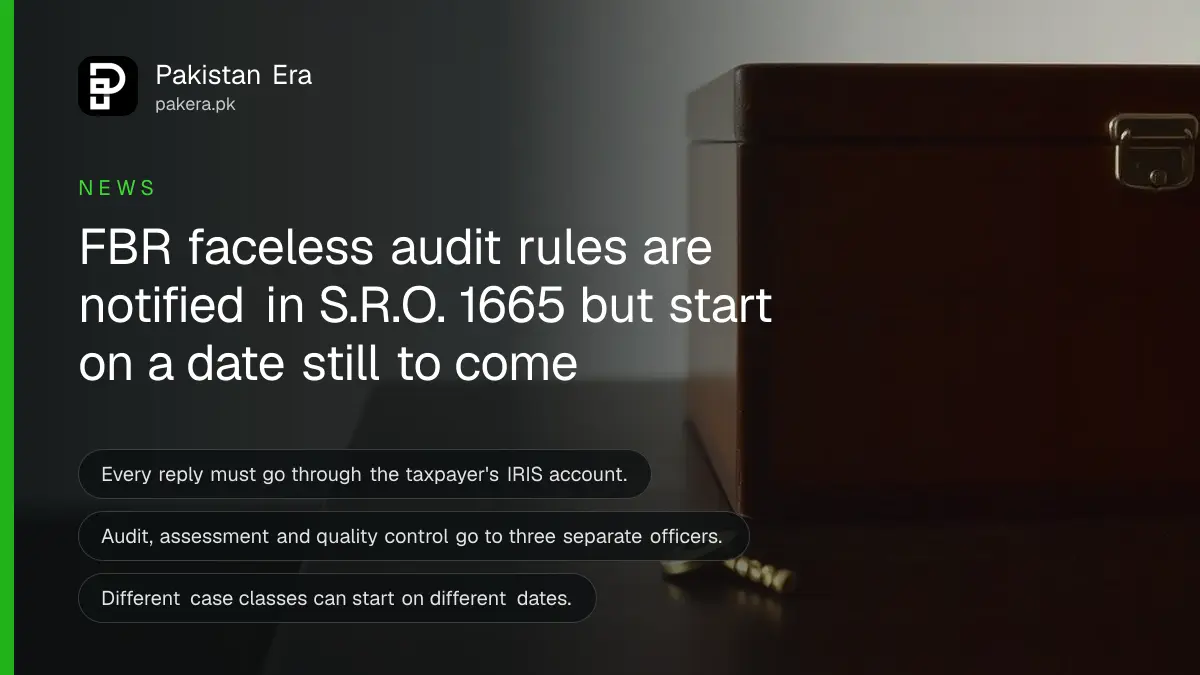 A closed wooden filing box and a brass key on a dark table, for news on FBR faceless tax audit rules in Pakistan