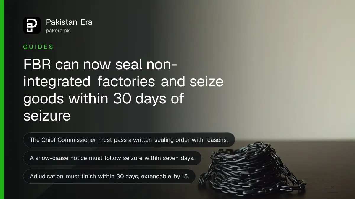 A coil of iron chain on a dark wooden table, for an article on fbr sealing factory